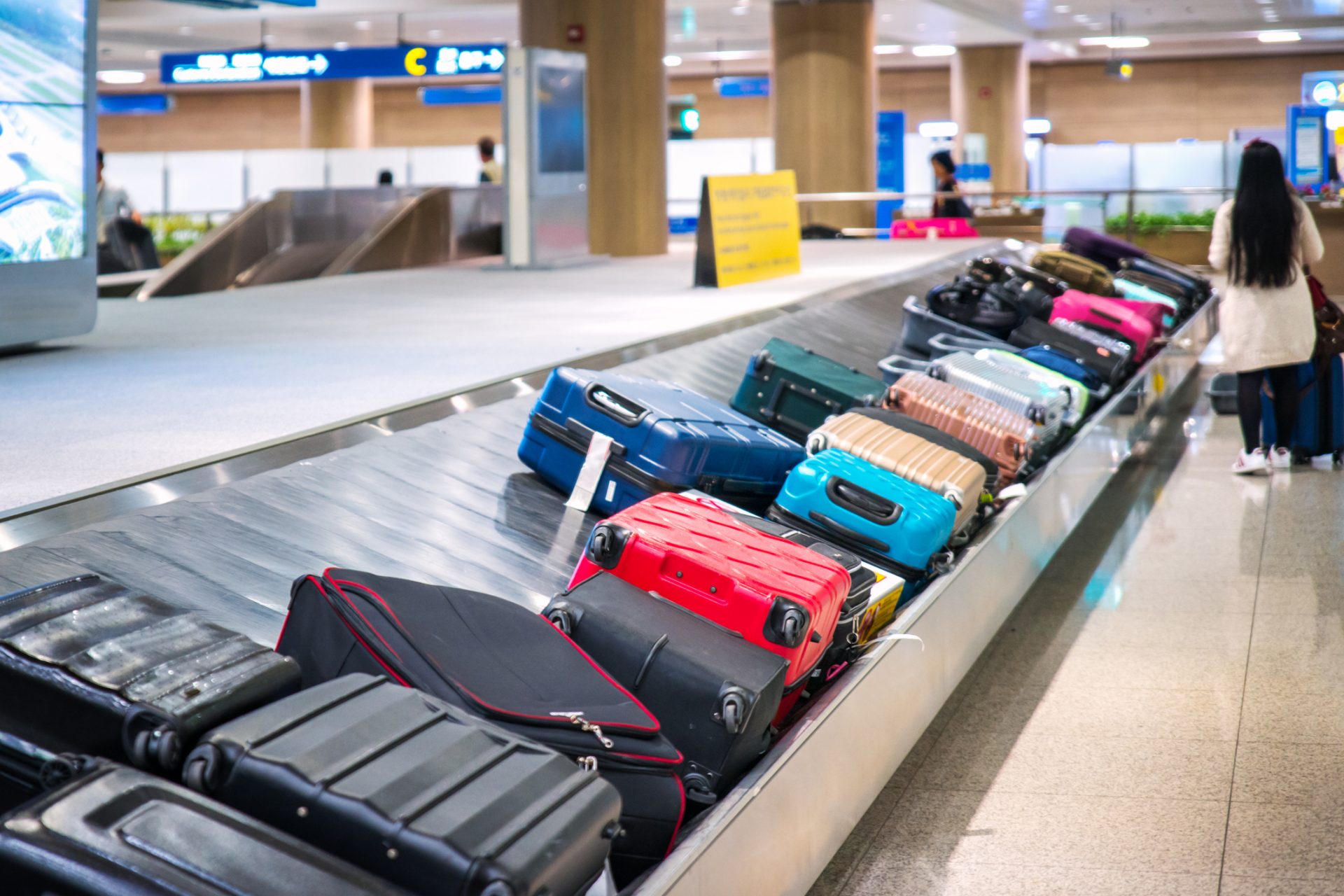 airport conveyor with luggage on it